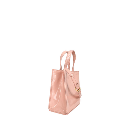 Shop Sarah Stewart Addie mini handbag in glossy blush pink patent leather with gold hardware and top handles