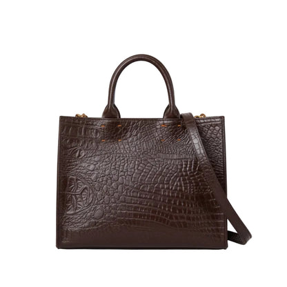 Shop Sarah Stewart Adelaide handbag in dark brown embossed goat skin leather with a detachable crossbody strap.