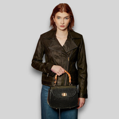 Shop Sarah Stewart Chloe handbag in black embossed goat skin suede with a bamboo handle and gold hardware