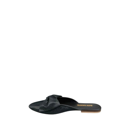 Shop Sarah Stewart Beverly Bow Mule in black lizard-embossed patent leather with a decorative bow detail.