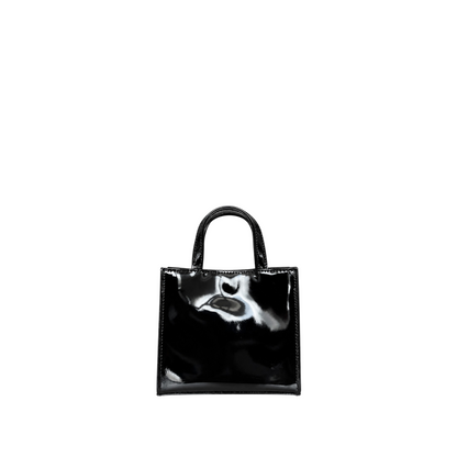 Shop Sarah Stewart black patent leather mini tote handbag with a high-shine finish and structured square silhouette.
