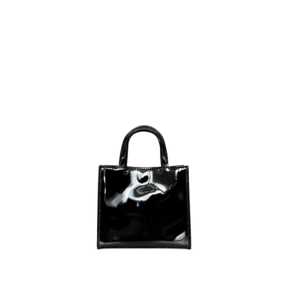 Shop Sarah Stewart black patent leather mini tote with a high-shine finish and structured top handle design.