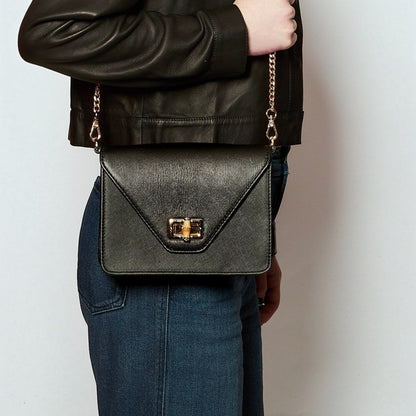 Shop Sarah Stewart The Stacey Stefano black saffiano leather crossbody bag with bamboo and metal hardware closure
