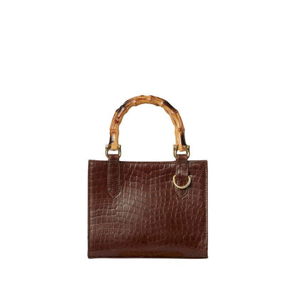 Shop Sarah Stewart Clara mini handbag in brown embossed goat skin with bamboo handles and gold hardware