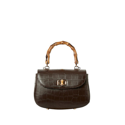 Shop Sarah Stewart Chloe handbag in brown embossed goat skin suede with a bamboo handle and gold hardware closure.