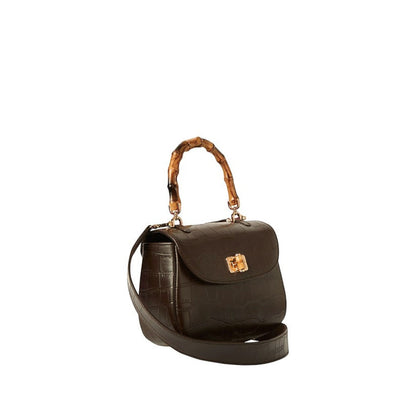 Shop Sarah Stewart The Chloe dark brown embossed goat skin suede handbag with a bamboo handle and gold closure.