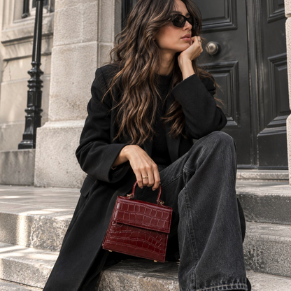 Shop Sarah Stewart The Robin handbag in burgundy crocodile-embossed goat skin leather with gold hardware