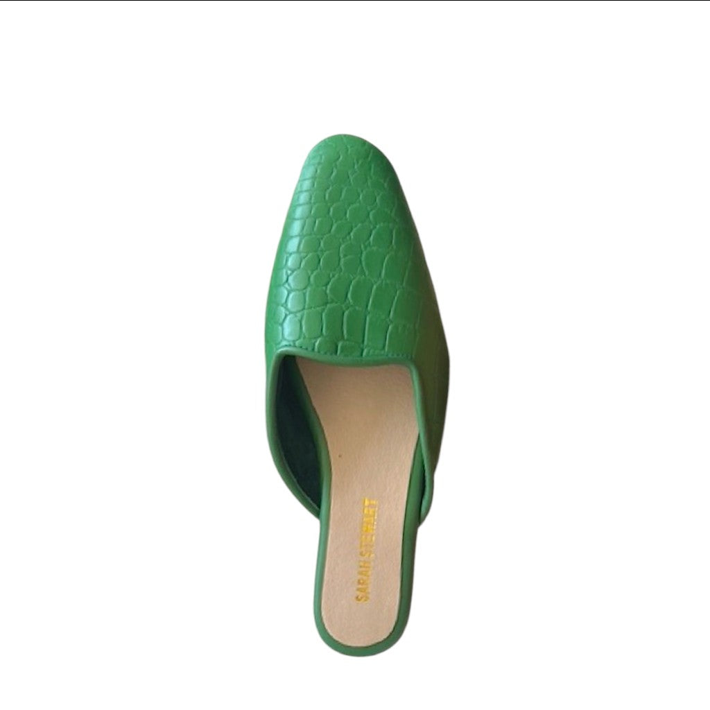 Shop Sarah Stewart Clara mule in green embossed goat skin leather with a chic square toe design