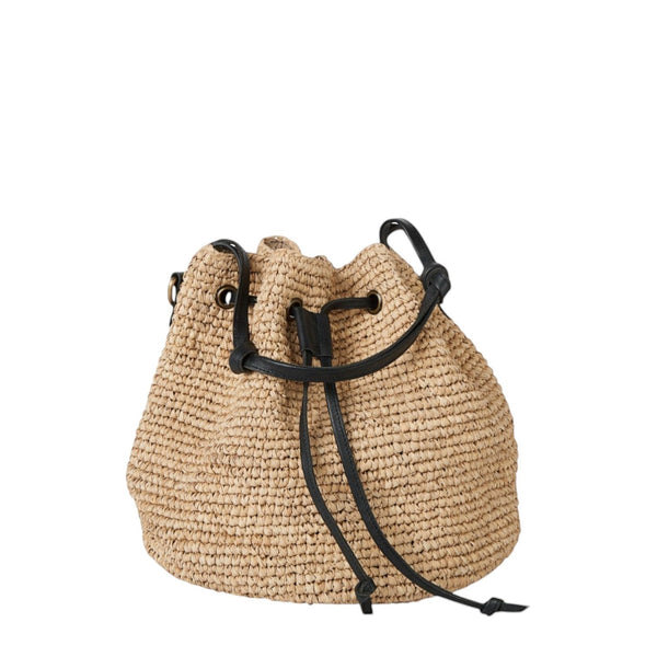 Shop Sarah Stewart The Jane raffia bucket bag with black leather trim, drawstring closure, and removable strap. Natural tan.