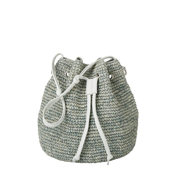 Shop Sarah Stewart The Jane raffia bucket bag with white leather trim and adjustable drawstring closure. Features short handle and crossbody strap.