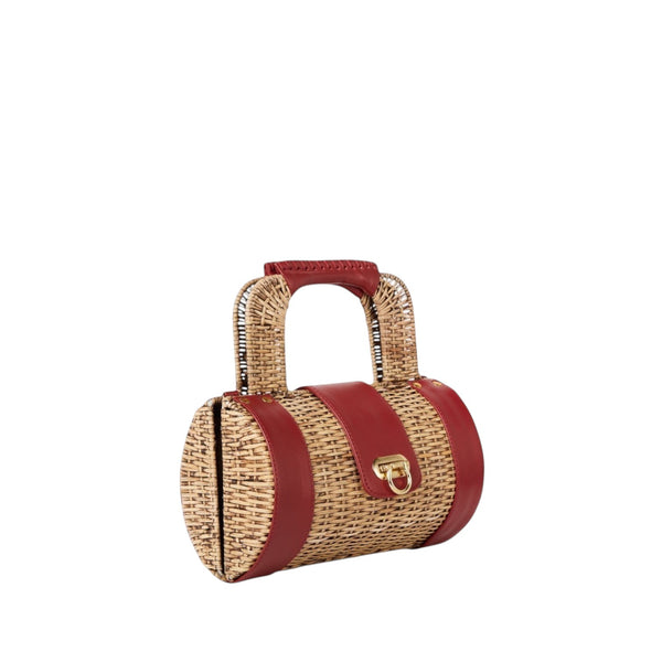 Shop Sarah Stewart The Jordan Handbag: Natural wicker barrel bag with red lambskin accents and gold hardware. 10"L x 6"H x 5"W.