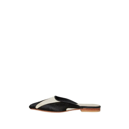 Shop Sarah Stewart Mabrey pointed-toe mule in black and white printed calf hair leather with a flat heel.