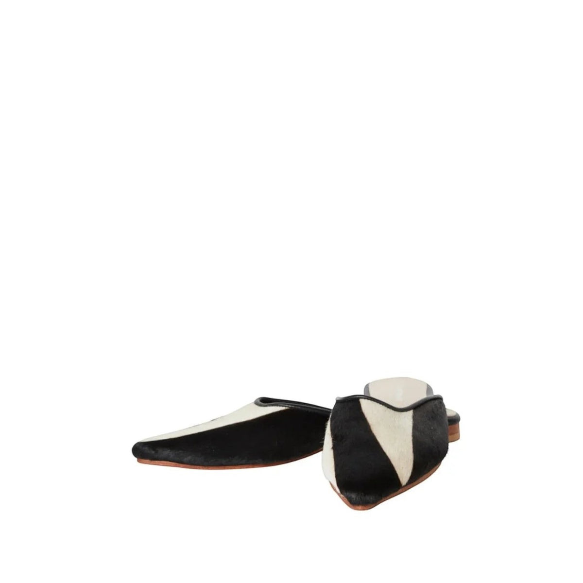 Shop Sarah Stewart Mabrey pointed-toe mules in black and white printed calf hair leather with a flat slip-on design.