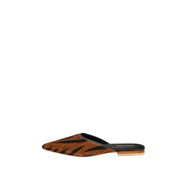 Shop Sarah Stewart Mabrey pointed-toe mule in brown and black tiger-print calf hair leather with a flat heel.