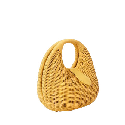 Shop Sarah Stewart Matilda yellow wicker handbag with leather accent and cotton lining. Modern design.