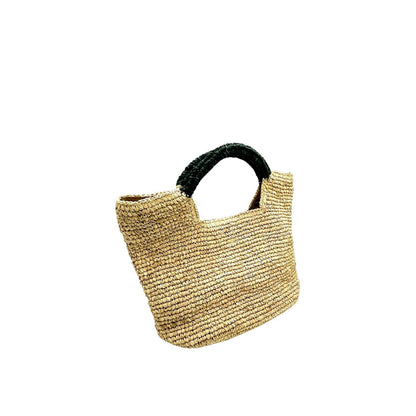 Shop Sarah Stewart The Opal raffia tote bag with black handles, cotton lining, and snap closure.