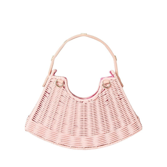 Shop Sarah Stewart pink handwoven wicker crescent bag with leather strap and gold floral accents.