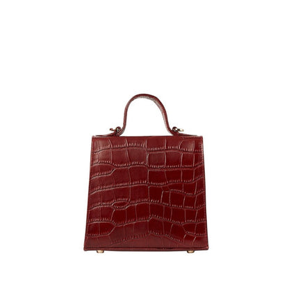 Shop Sarah Stewart The Robin handbag in deep red goat skin leather with a crocodile pattern and gold hardware.