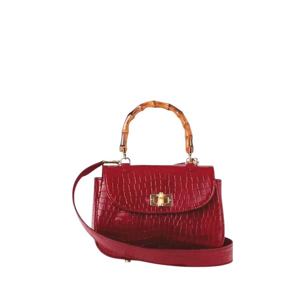 Shop Sarah Stewart red embossed goat skin suede handbag with bamboo handle and gold bamboo-style closure