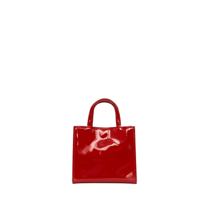 Shop Sarah Stewart Addie mini handbag in glossy red patent leather with a structured square silhouette.