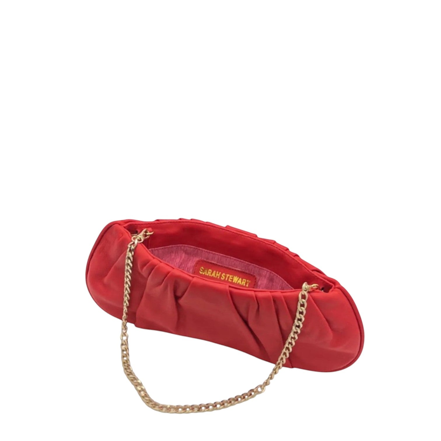 Shop Sarah Stewart red pleated lambskin leather clutch with a gold chain strap and pink taffeta interior lining