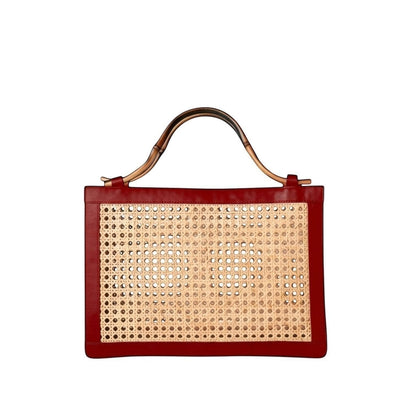 Shop Sarah Stewart The Reece structured handbag in natural wicker with red lambskin leather trim and bamboo handle.