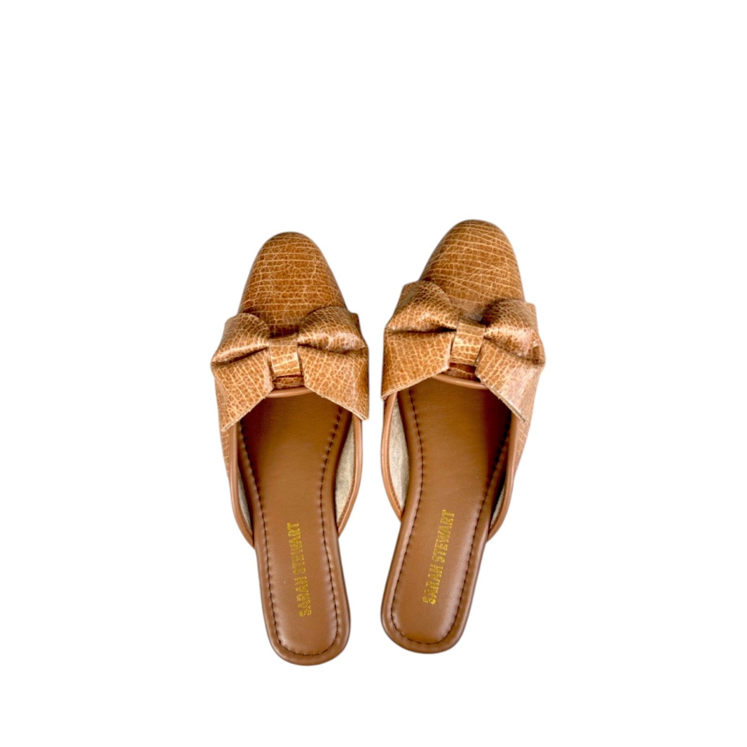 Shop Sarah Stewart Beverly Bow Mule in tan lizard-embossed patent leather with a decorative bow detail