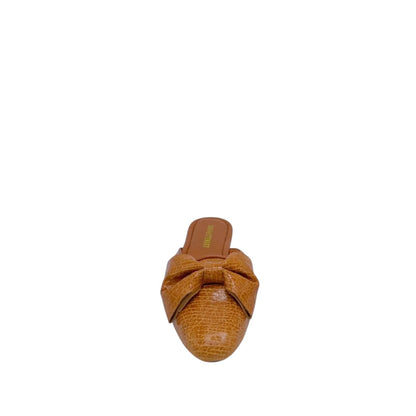 Shop Sarah Stewart Beverly Bow Mule in tan lizard-embossed patent leather with a decorative bow detail.