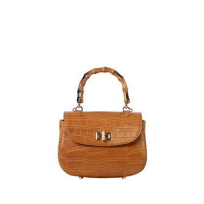 Shop Sarah Stewart Chloe handbag in tan embossed goat skin suede with a bamboo handle and gold hardware closure.