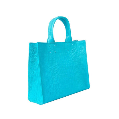 Shop Sarah Stewart Adelaide handbag in bright turquoise embossed croc goat leather with top handle, side view