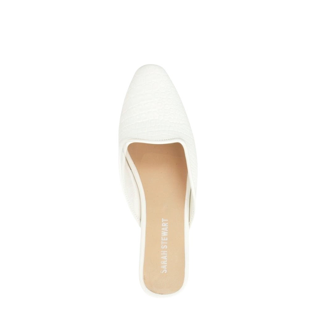 Shop Sarah Stewart white embossed goat skin leather mule with a vintage-inspired square toe, top-down view.
