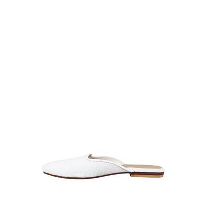Shop Sarah Stewart Clara mule in white embossed goat skin leather with a vintage-inspired square toe flat silhouette.