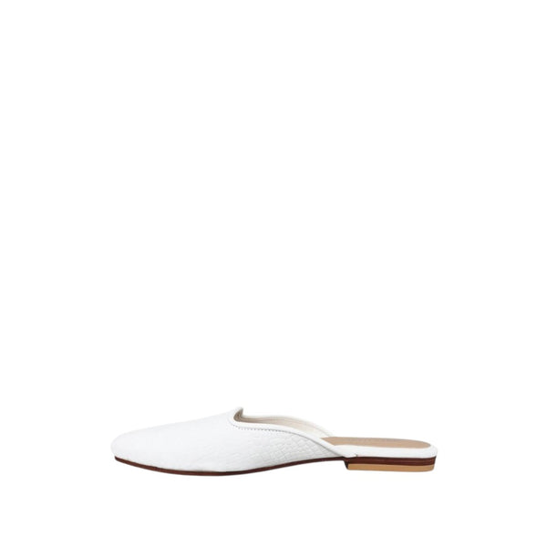 Shop Sarah Stewart Clara mule in white embossed goat skin leather with a vintage-inspired square toe flat silhouette.